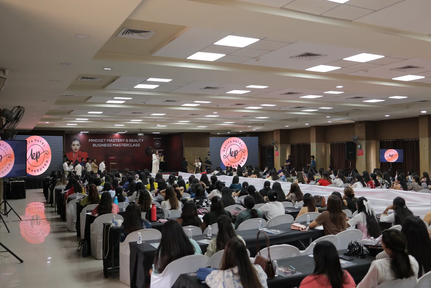 Students attending a Kavita Patel makeup workshop