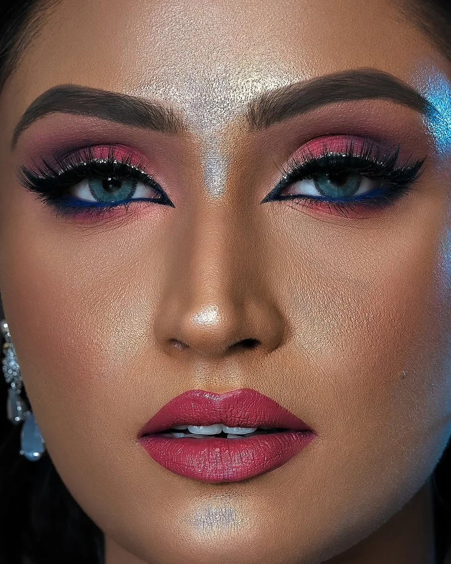Bold eye makeup and luminous skin finish